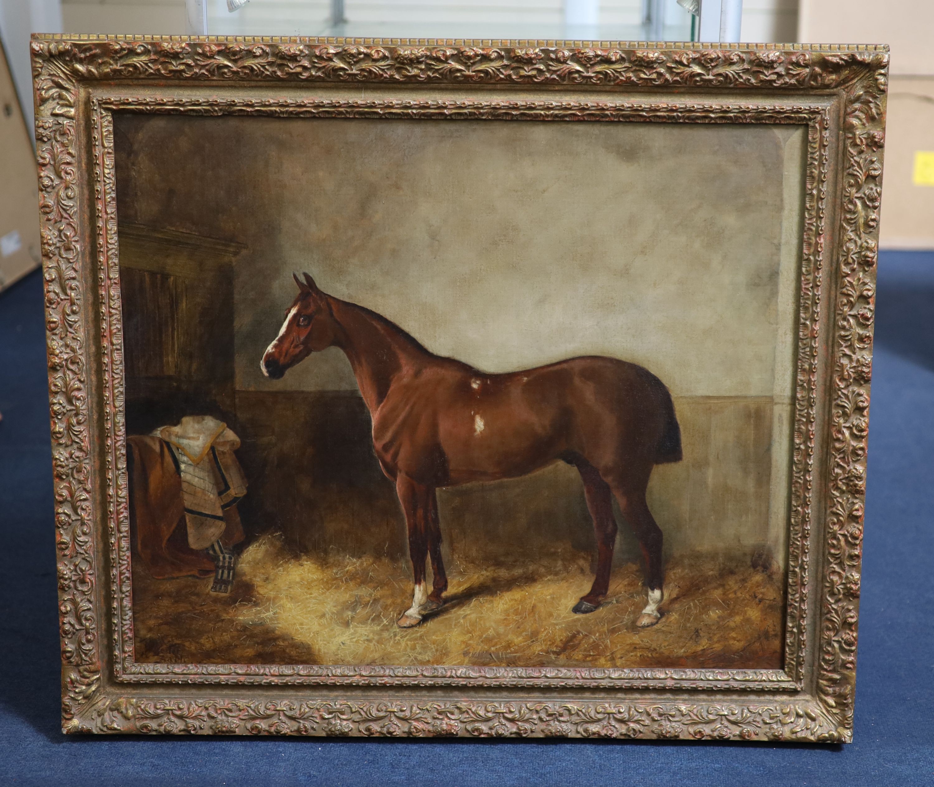 19th century English School, Portrait of a chestnut horse in a stable, Oil on canvas, 62 x 74cm.